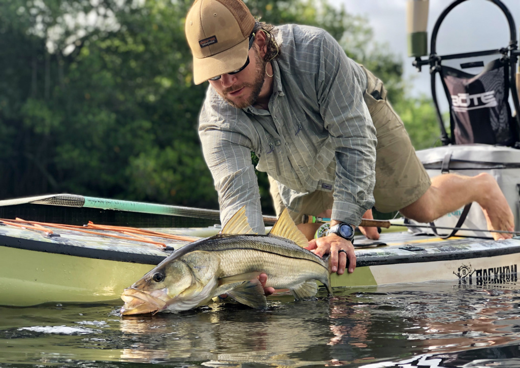 Drew catching snook on SUP